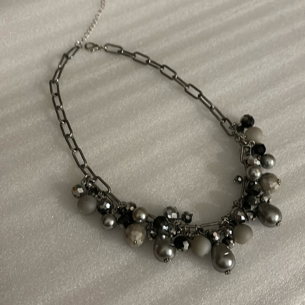 Silver Metallic choker necklace.